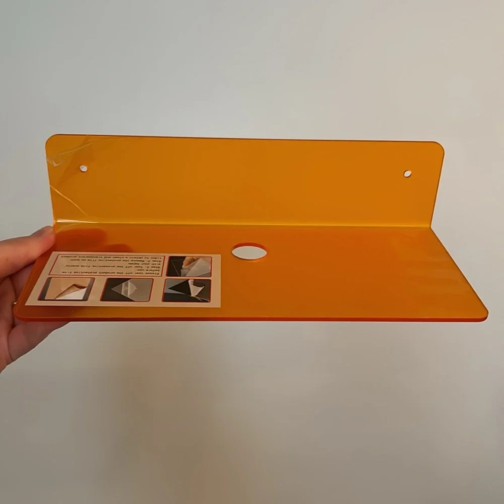 • 2 orange acrylic shelves •